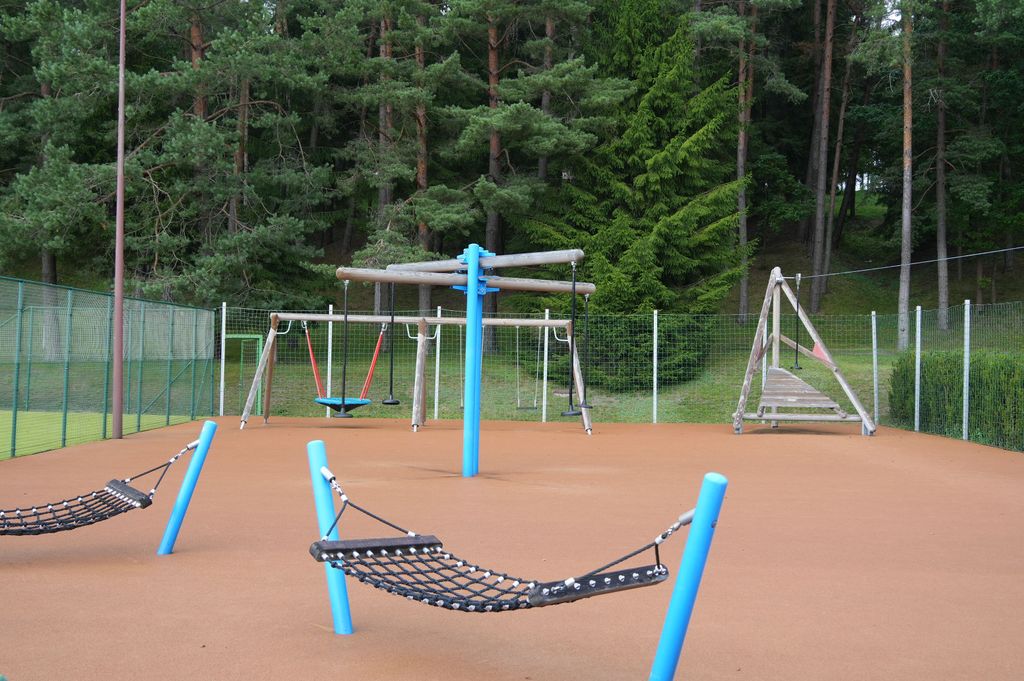 Outdoor playground with engaging activities for active and playful relaxation in nature.