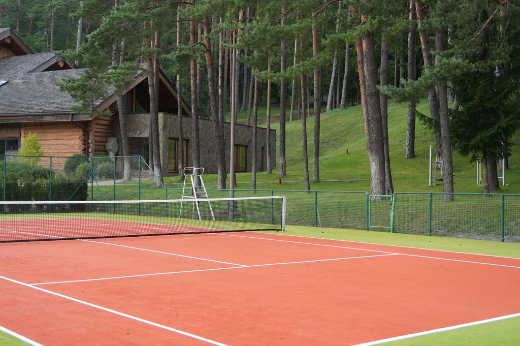 Tennis activities surrounded by nature designed for rest, balance, and connection.