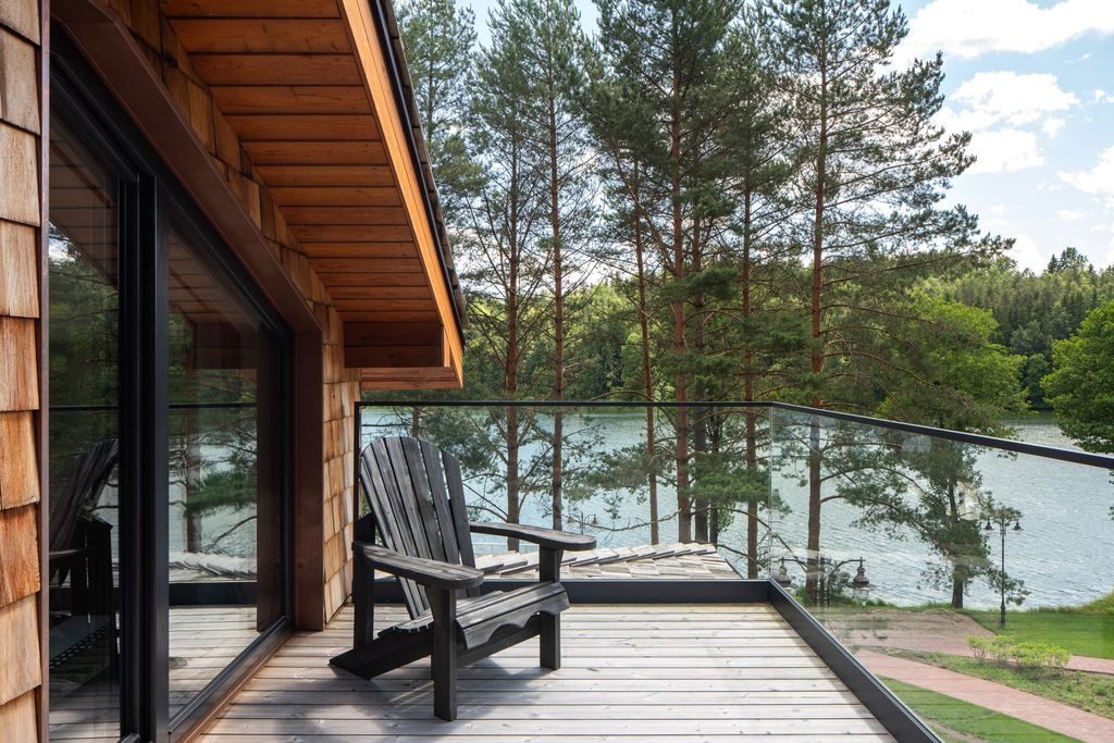 Loft suite with terrace at a luxury resort surrounded by nature and scenic views.