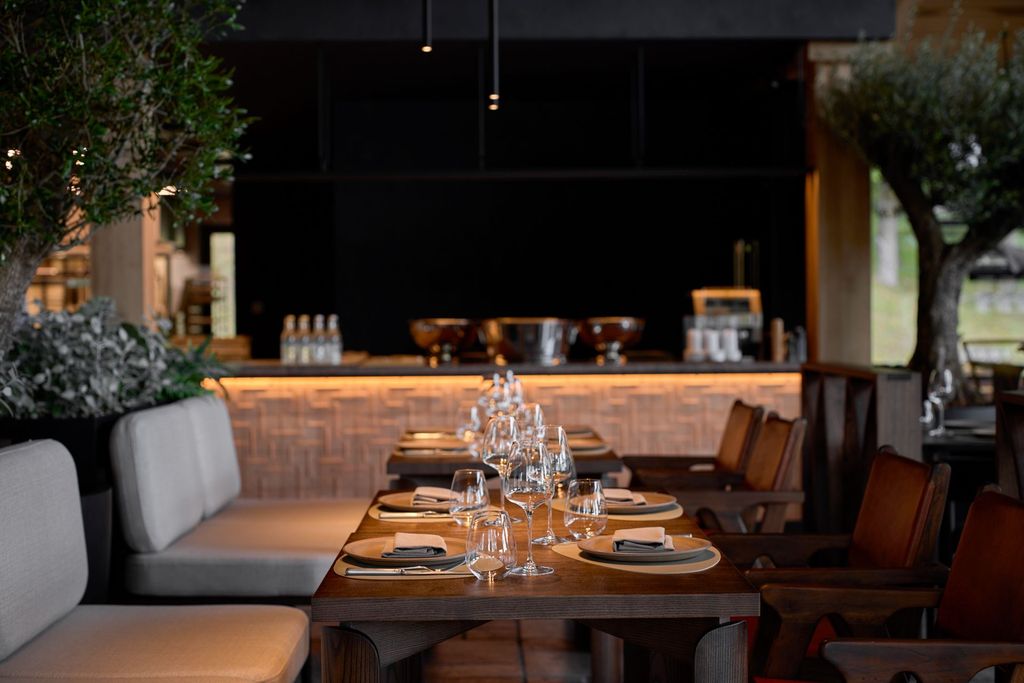 Fine dining restaurant with elegant interiors offering a gourmet dining experience.