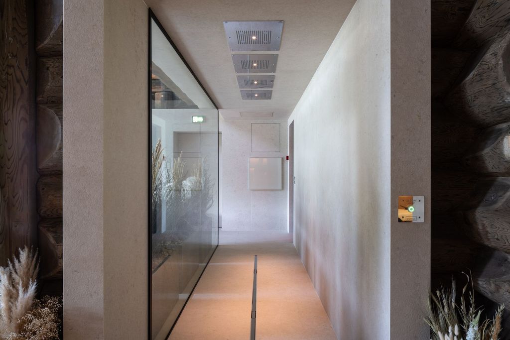 Esperanza Spa shower area with warm wood tones and calming wellness style.