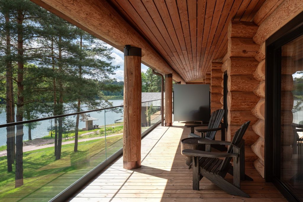 Stylish lakeview suite at luxury resort for nature-inspired stays with serene water views.