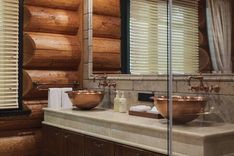 Elegant villa bathroom with warm wood accents, modern fittings, and high-end amenities.